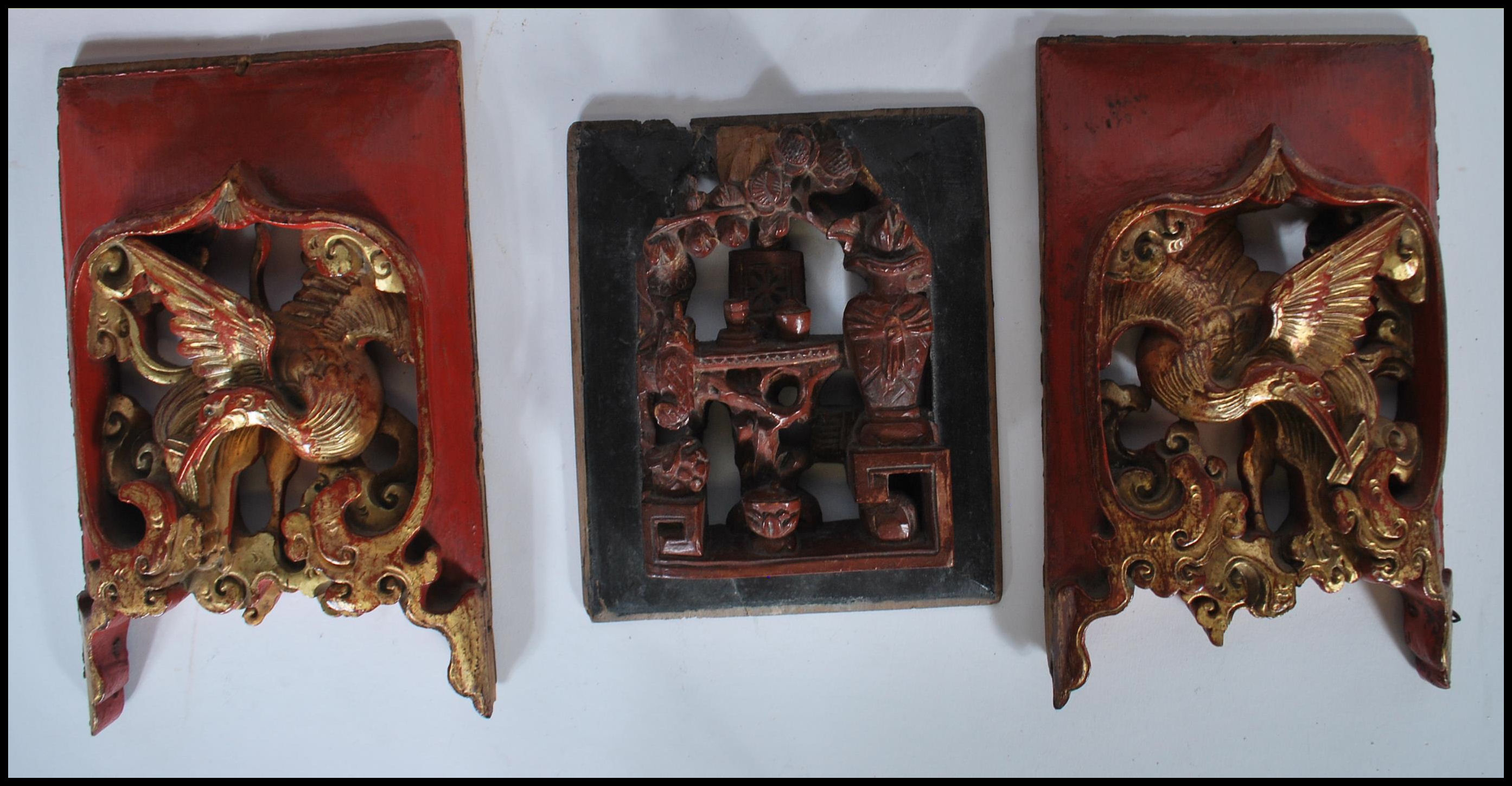 A selection of carved Chinese wooden wall panels / plaques to include a red lacquered panel with - Image 7 of 8