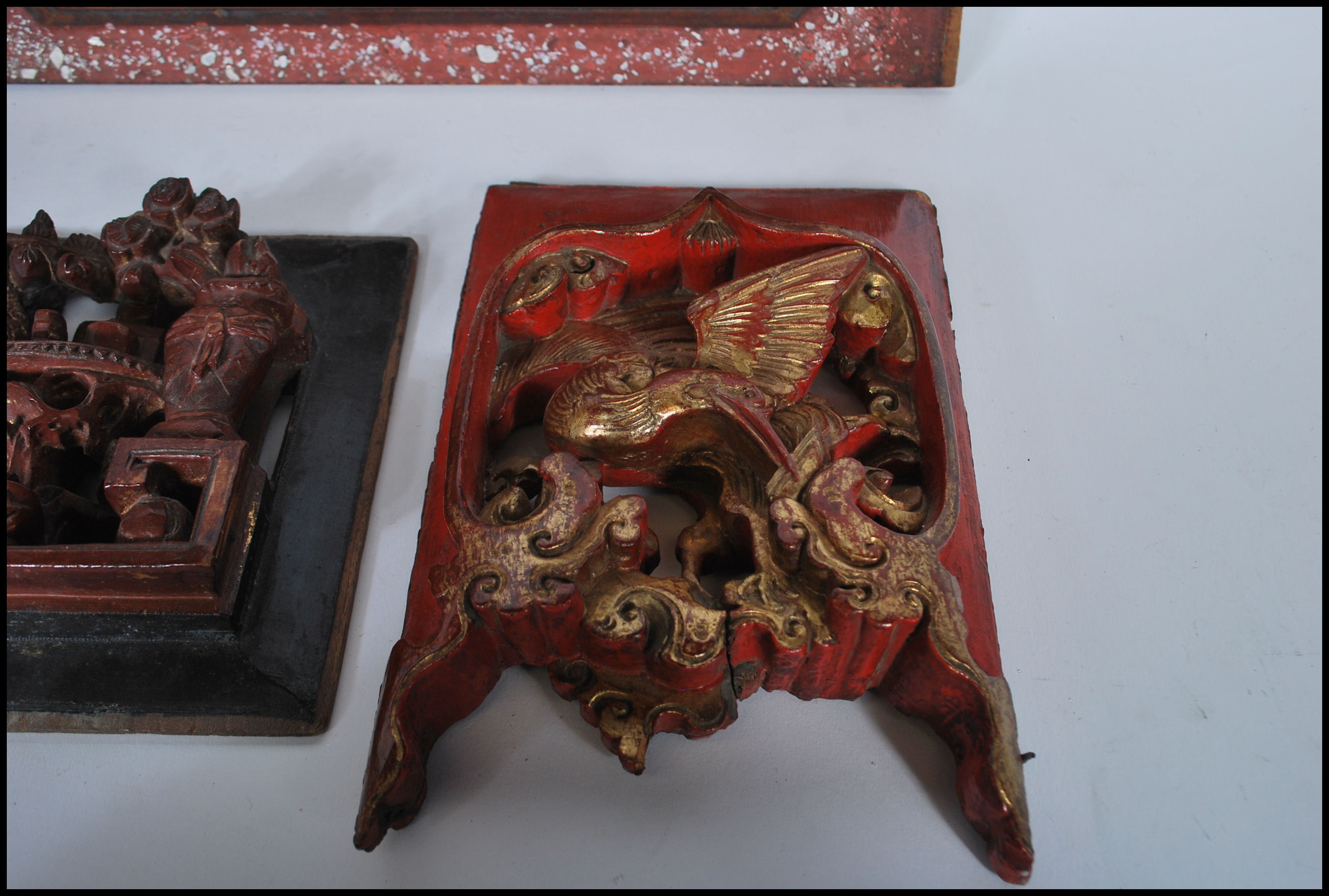 A selection of carved Chinese wooden wall panels / plaques to include a red lacquered panel with - Image 6 of 8