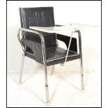 A vintage retro circa 1960's child's high chair, raised on chrome tubular base, vinyl upholstered