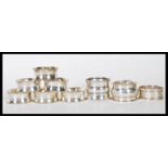 A collection of silver napkin rings to include an