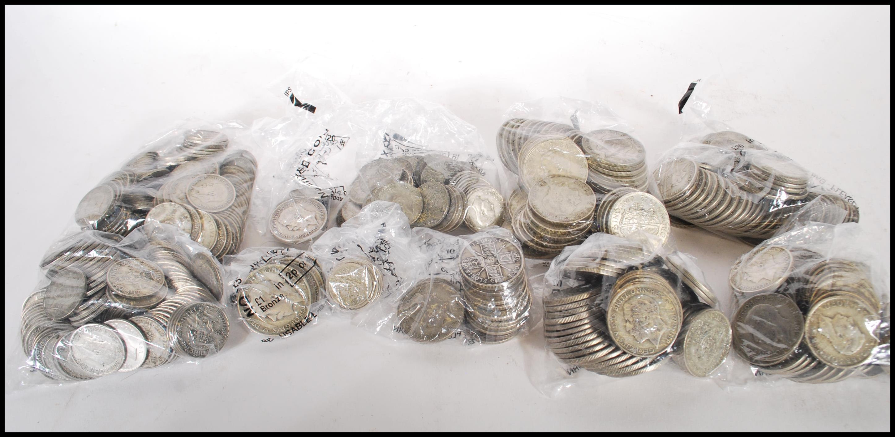 A collection of early 20th Century 1921-1946 half silver coins to include, shillings, half crowns,