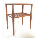 A retro 20th Century teak wood Danish inspired side / occasional table of square form, frieze top