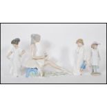 A collection 20th Century ceramic figures to include a Roumano Spanish porcelain figure of a