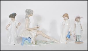 A collection 20th Century ceramic figures to include a Roumano Spanish porcelain figure of a