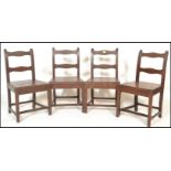 A set of four 18th / 19th Century Georgian country oak peg jointed  dining chairs, rail back with