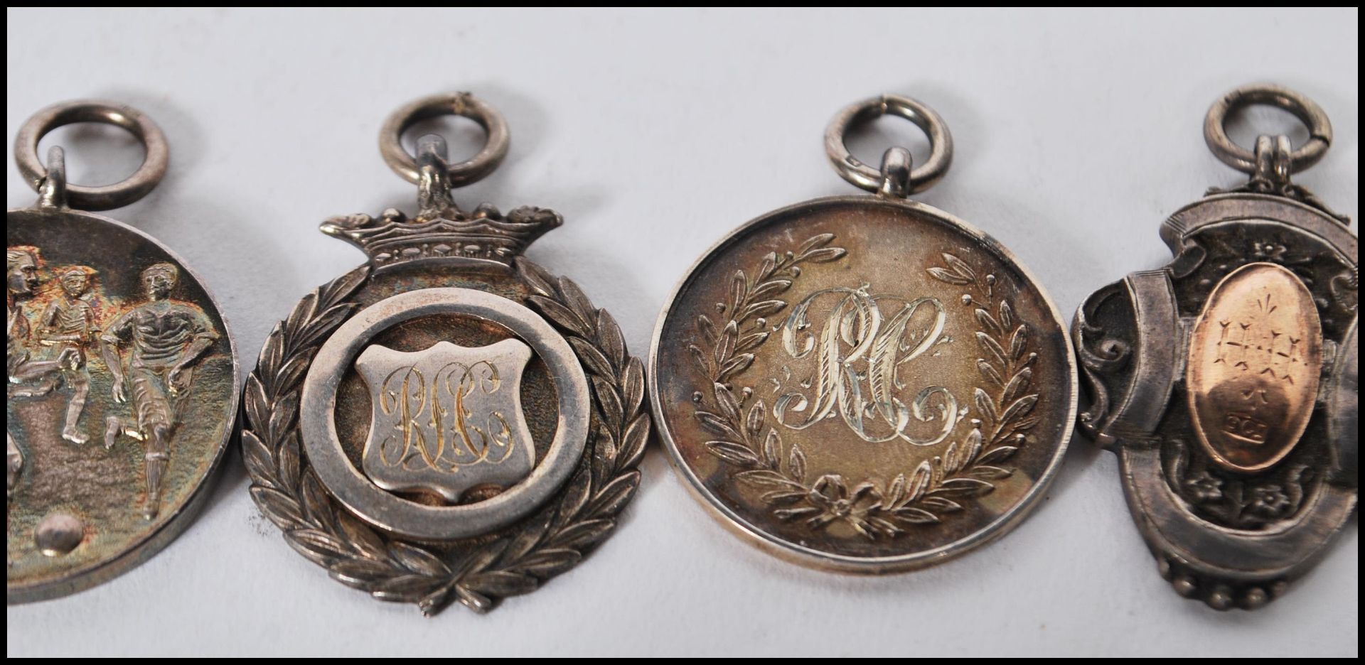 A collection of early 20th Century silver hallmarked sporting fob medals, two having gold plated - Image 3 of 8