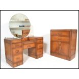 A early 20th Century 1930's Art Deco oak dressing table, having large circular mirror to center
