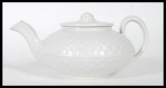 An 19th century Wedgwood caneware teapot having ba