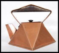 A early 20th Century Art Deco copper kettle in the