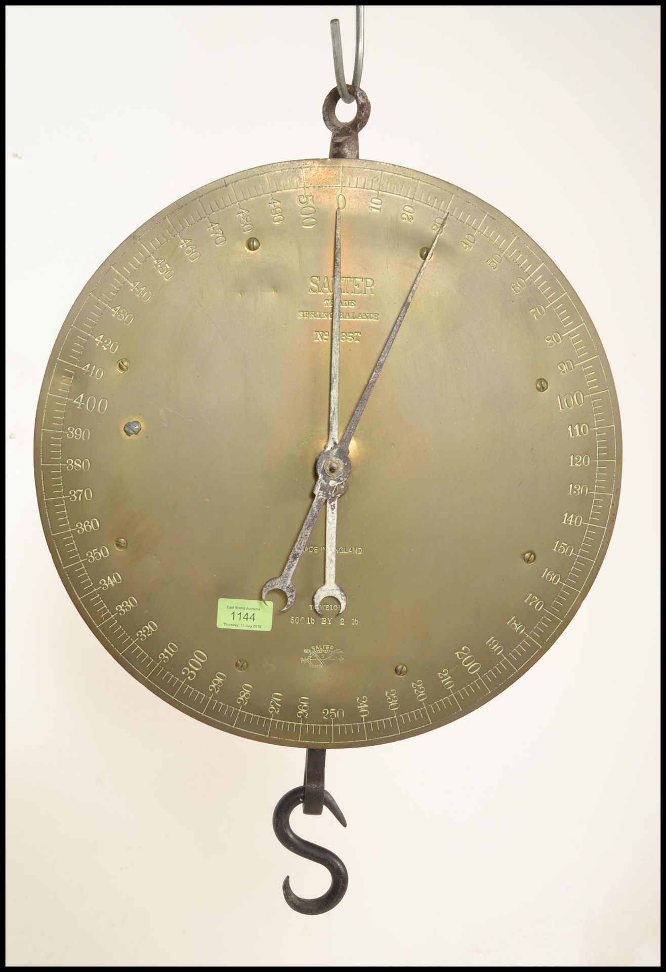 A Victorian brass and iron Salter`s Trade spring balance scale, circular brass register with iron