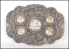 A 20th Century Chinese carved soapstone brush / ink palette having five circular panels with