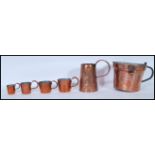 A collection 19th and 20th Century copper measures to include 1/2 pint, 1.5 gill, 1 gill, 1/2 gill