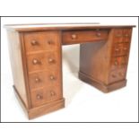 A Victorian 19th century solid mahogany twin pedestal office desk. Raised on plinth bases, each with