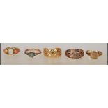 A collection of 18ct and 9ct scrap gold rings. 18ct gold ring with floral decoration approx weight