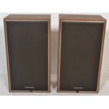 A pair of vintage retro 20th Century teak wood cased Dovedale music speakers.