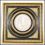 A 20th century gilt framed wall plaque being cast in relief and entitled ' The First Appeal ' (