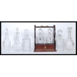 A collection of 20th century decanters to include facet cut, cut glass crystal and other shapes