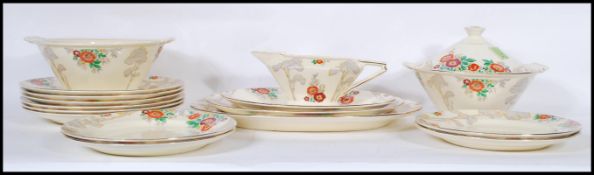 A early 20th Century 1930's Art Deco part dinner service by Royal Cauldon, having hand painted