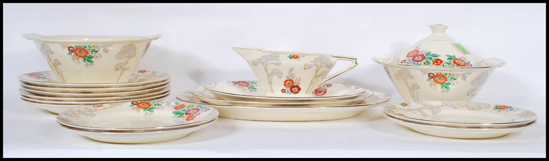 A early 20th Century 1930's Art Deco part dinner service by Royal Cauldon, having hand painted