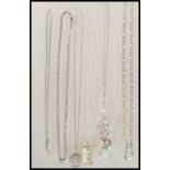 A collection of stamped 925 silver necklaces to include two flat link chains, a St Christopher