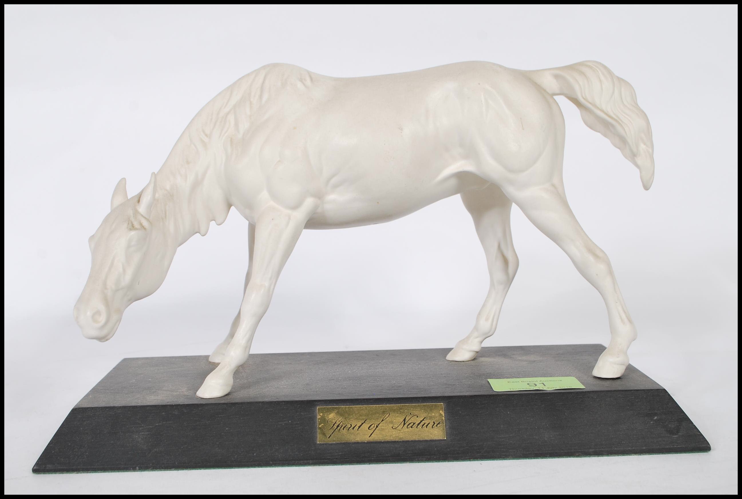 A modern Beswick porcelain figurine entitled ‘ The spirit of Nature ‘ being mounted on plinth and