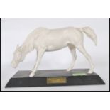 A modern Beswick porcelain figurine entitled ‘ The spirit of Nature ‘ being mounted on plinth and