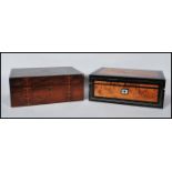 A 19th century Regency amboyna wood writing slope box of rectangular form with ebony crossbanding