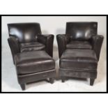 A pair of contemporary black leather club armchair