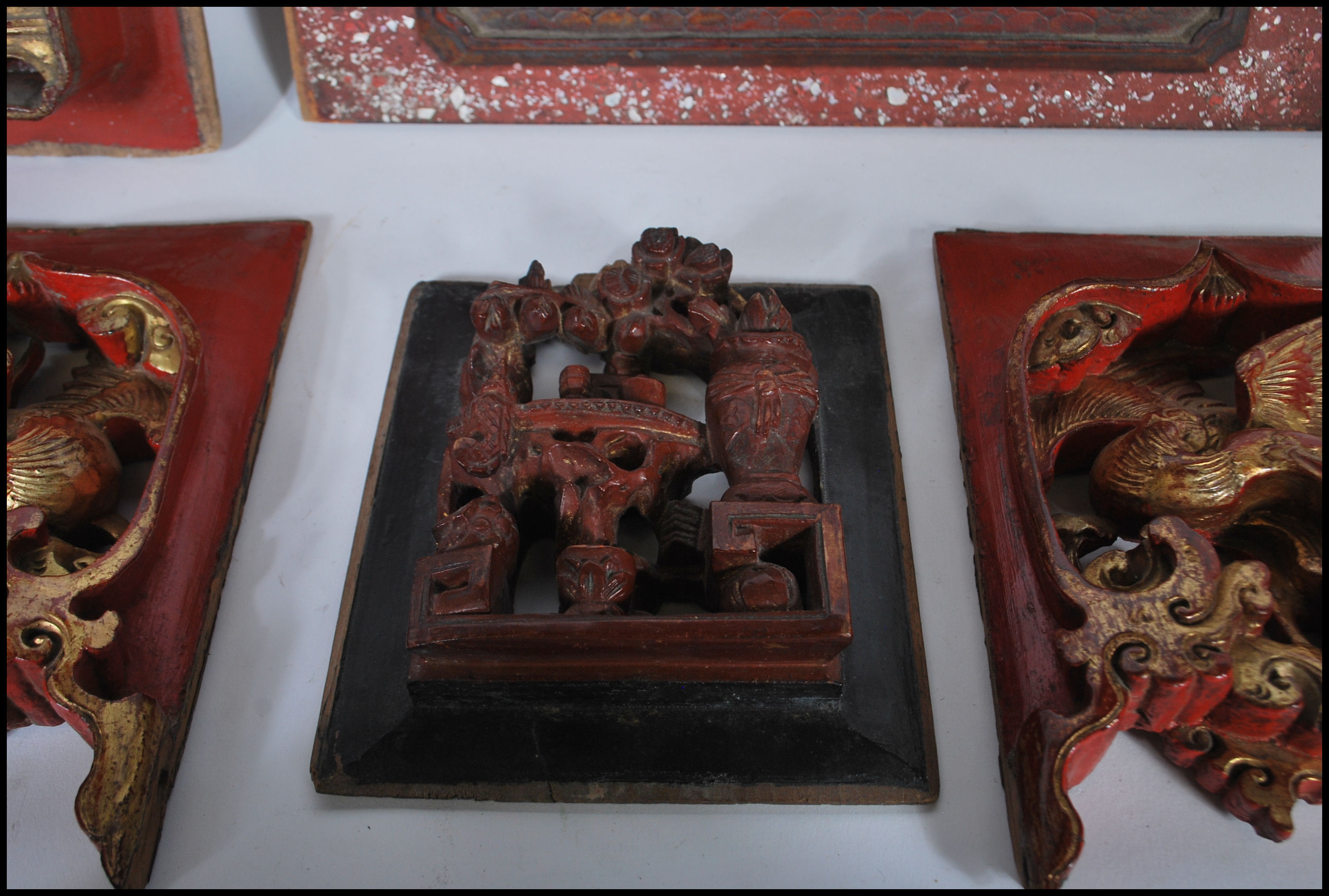 A selection of carved Chinese wooden wall panels / plaques to include a red lacquered panel with - Image 5 of 8