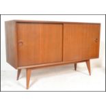 A vintage mid 20th Century Vanson walnut sideboard / credenza having twin doors to the front opening