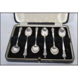 A set of six cased silver hallmarked Apostle teaspoons, the spoons with retailers mark for H & R