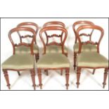 A set of 6 19th century Victorian mahogany balloon back dining chairs. Raised on turned legs with