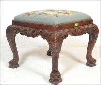 A good quality antique style Chinese Chippendale manner foot stool. The large cabriole legs with