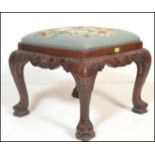 A good quality antique style Chinese Chippendale manner foot stool. The large cabriole legs with