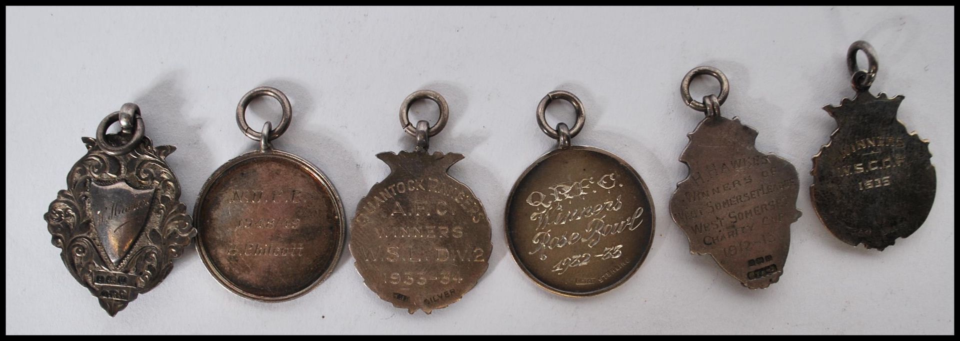 A collection of early 20th Century silver hallmarked sporting fob medals, two having gold plated - Image 5 of 8