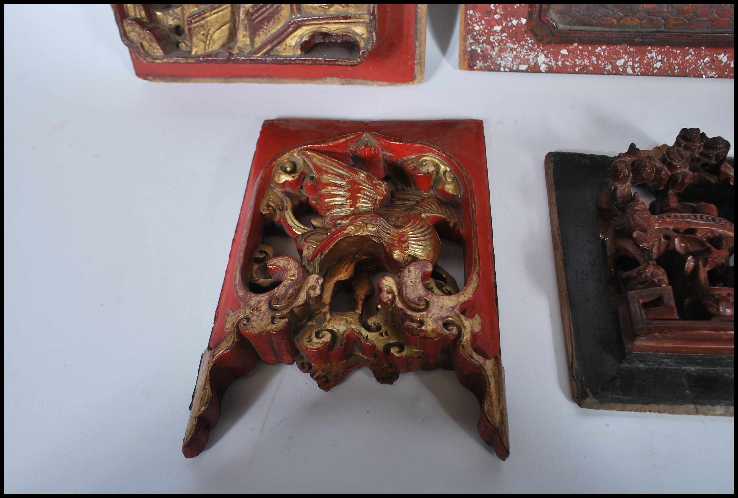 A selection of carved Chinese wooden wall panels / plaques to include a red lacquered panel with - Image 4 of 8