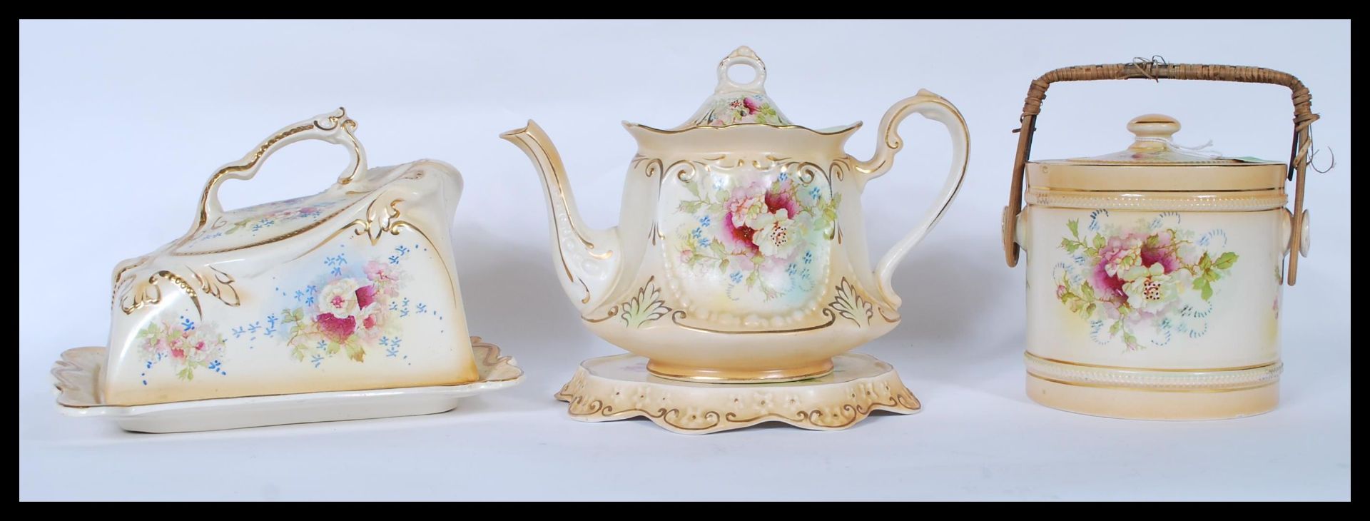 A late 19th / early 20th Century teapot on stand by Wm Adams and Co Crown Semi-Porcelain having