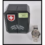 A cased Swiss Military wristwatch by Charmex of Switzerland. The watch set to a stainless steel