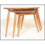 Lucian Ercolani - Ercol - Pebble - A 1970's beech and elm wood nest of table raised on spindle legs.