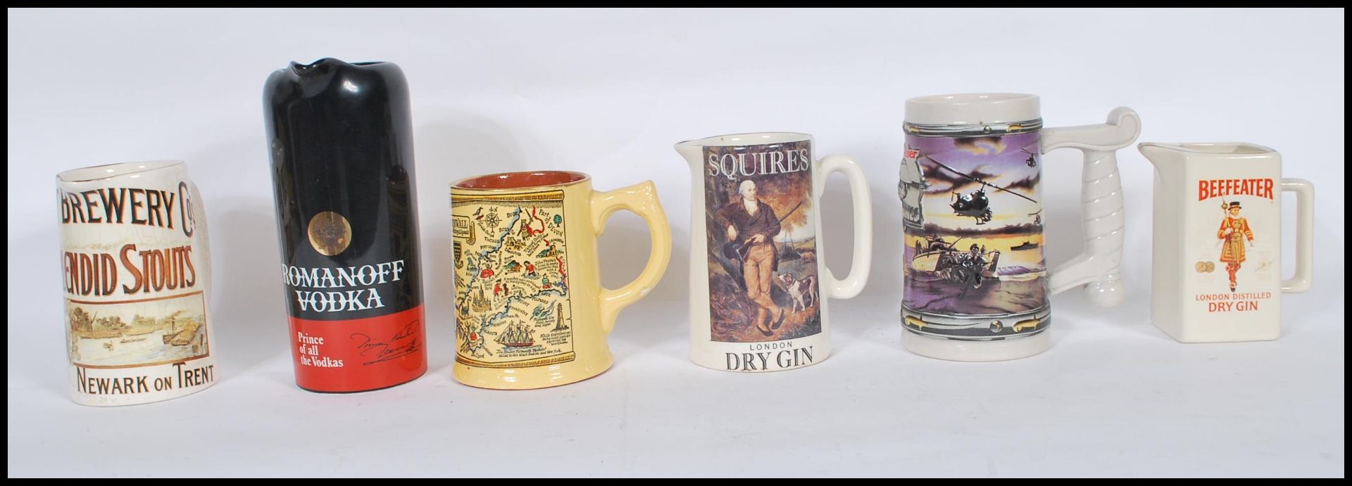 Breweriana  - A collection of vintage ceramic advertising point of sale public house water jugs to