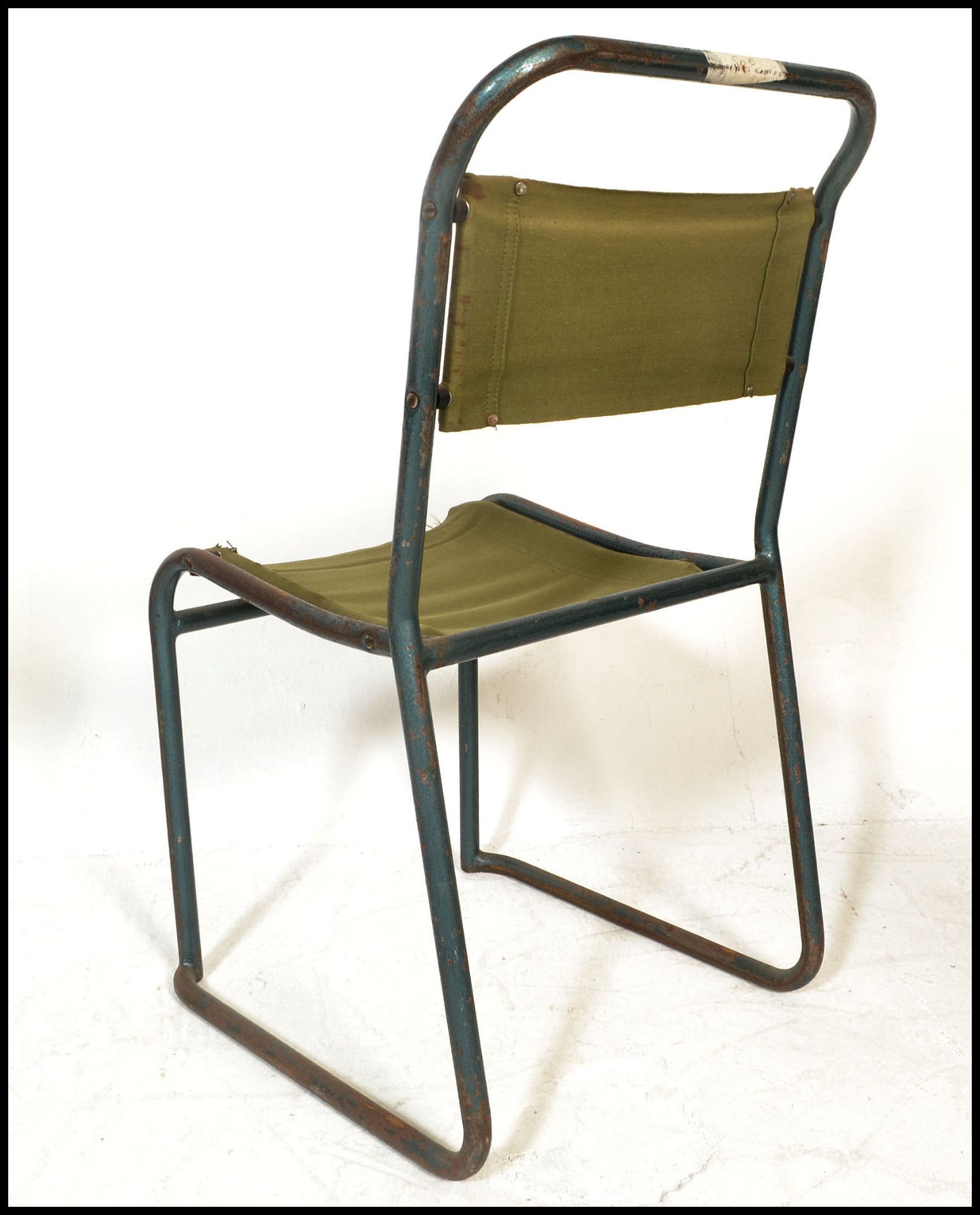 A set of four vintage mid 20th Century metal tubular stacking chairs, original canvas seat pads - Bild 6 aus 7