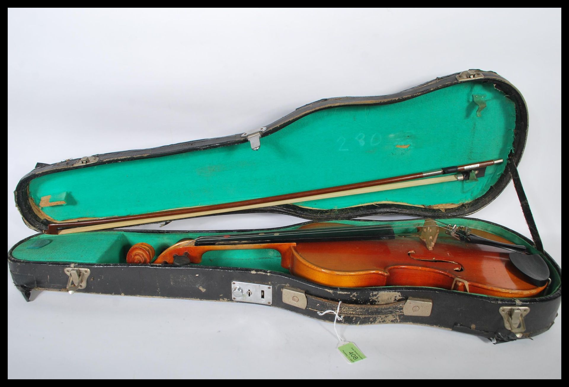 A 20th Century Chinese made student violin musical instrument by Lark contained within fitted case