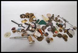 A collection of vintage 20th Century collectible jewellery items to include mixed enamelled cap