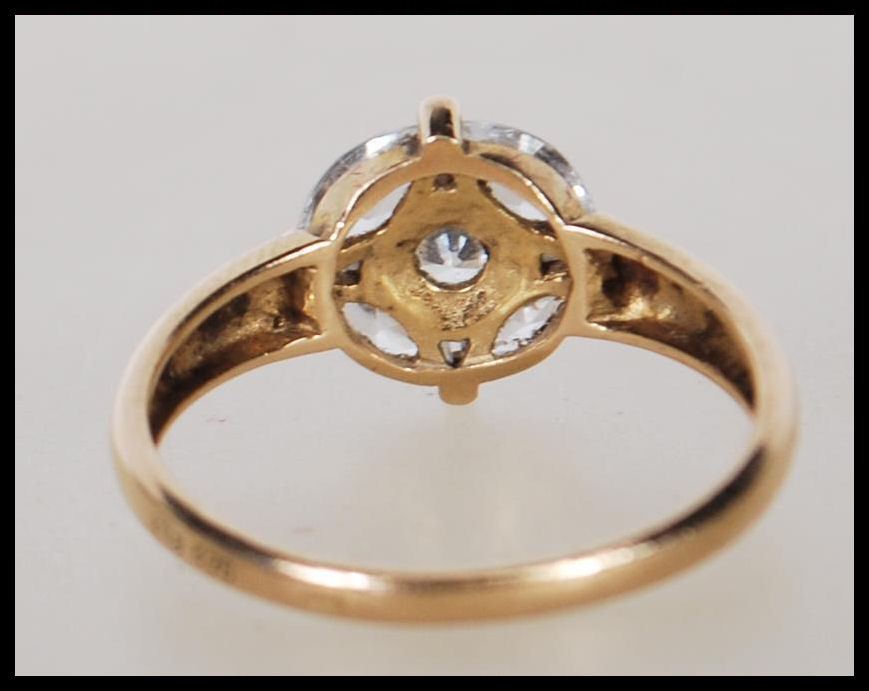 A stamped 375 9ct gold ring set with five white stones to the head. Weight 2.1g. Size O.5. - Image 3 of 5