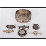 A collection of silver jewellery dating from the 19th Century onwards to include three silver