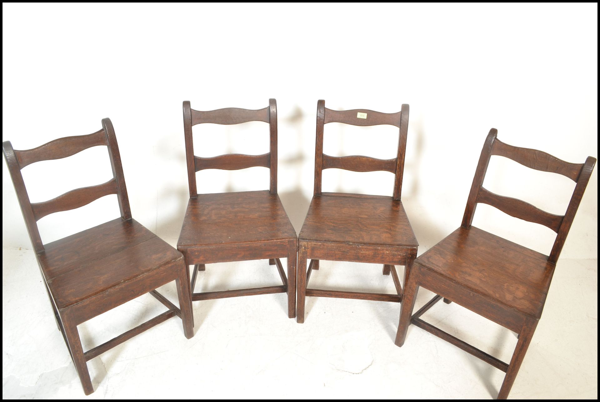 A set of four 18th / 19th Century Georgian country oak peg jointed  dining chairs, rail back with - Image 2 of 4