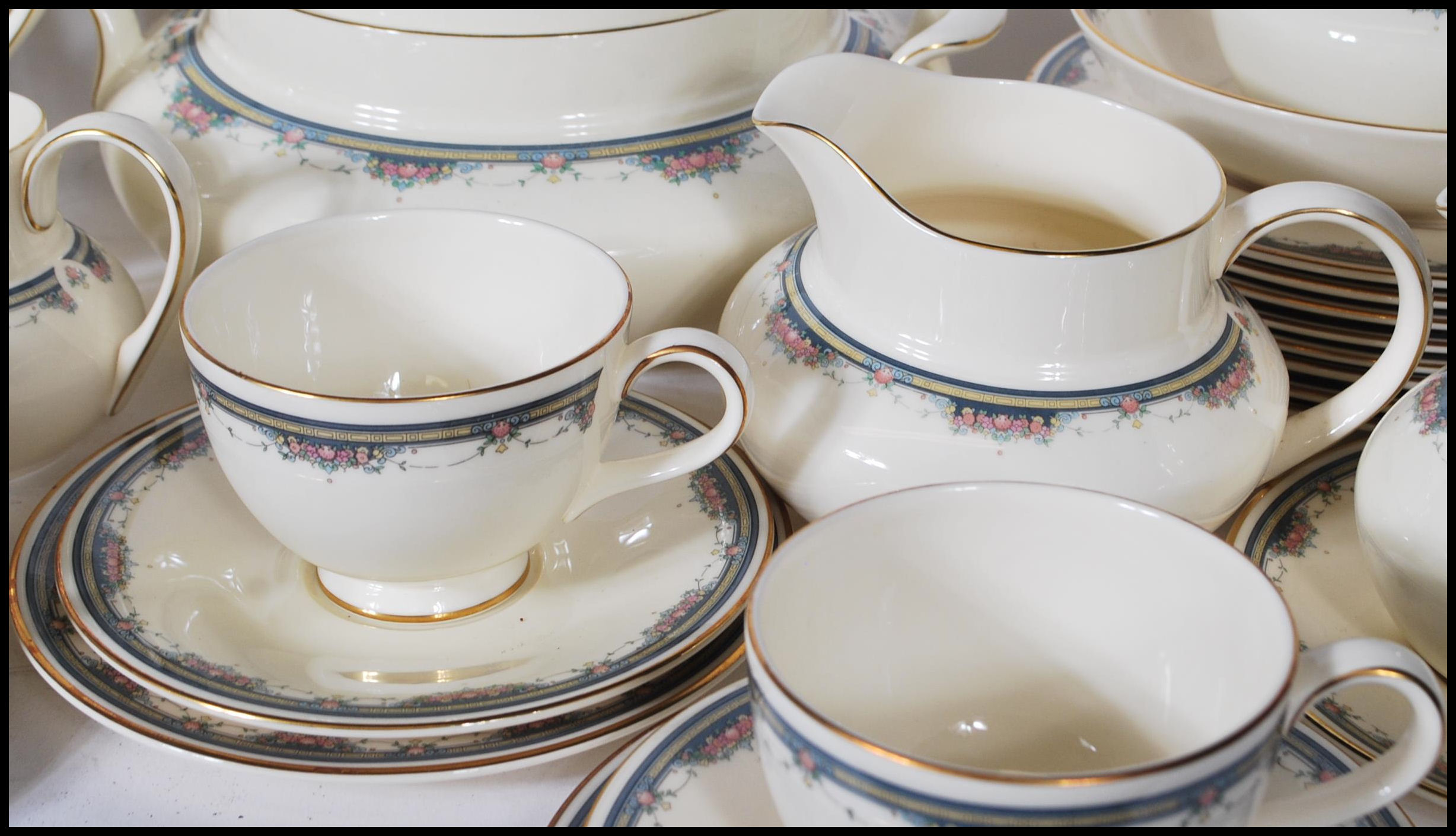 A 20th Century dinner and tea service by Royal Doulton in the Albany pattern having ivory white - Image 8 of 11