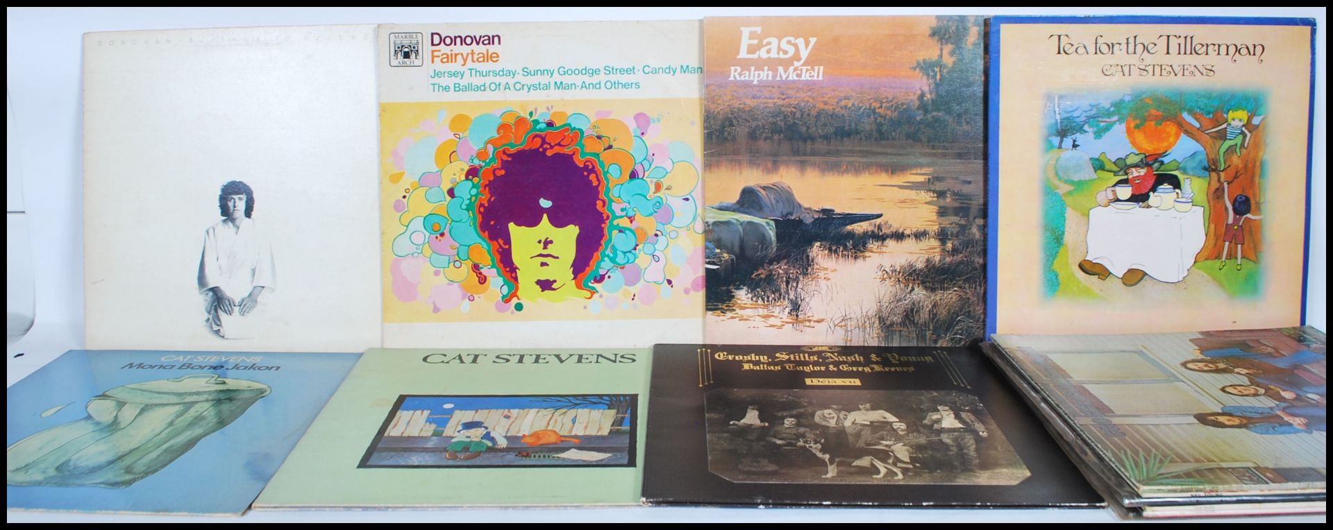 A collection of long play LP vinyl record folk albums to include Don McLean American Pie, Neil Young