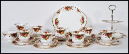 A Royal Albert Old Country Roses part tea set to include creamer jug, sugar bowl, cups, saucers,