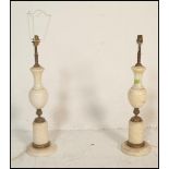 A 20th Century alabaster / marble table lamp of baluster form set to a square base together with a